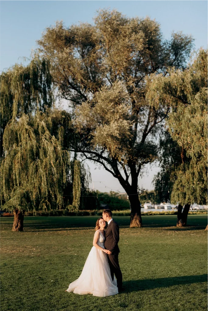 Intimate portrait of a couple sharing a quiet moment in a New Zealand garden, Vowly Wedding Video Production.